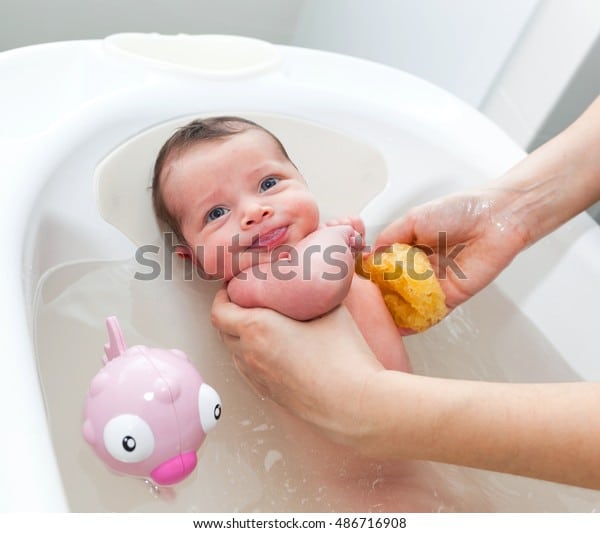 First Bath Newborn Baby Girl Mom Stock Photo (Edit Now) 486716908