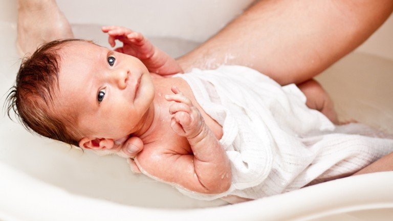 How long after birth should I wait to bathe my baby?