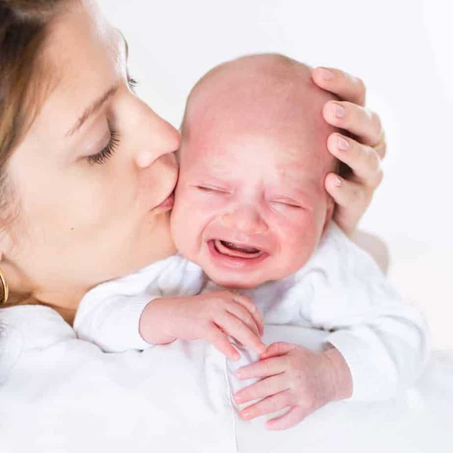 How to Calm A Fussy Baby: Why Babies Cry &  How to Soothe Them