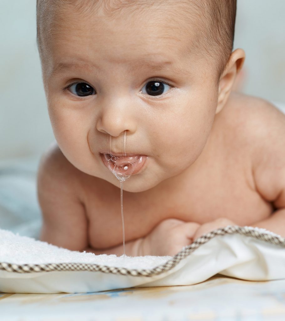 How to get spit up stains out of baby clothes