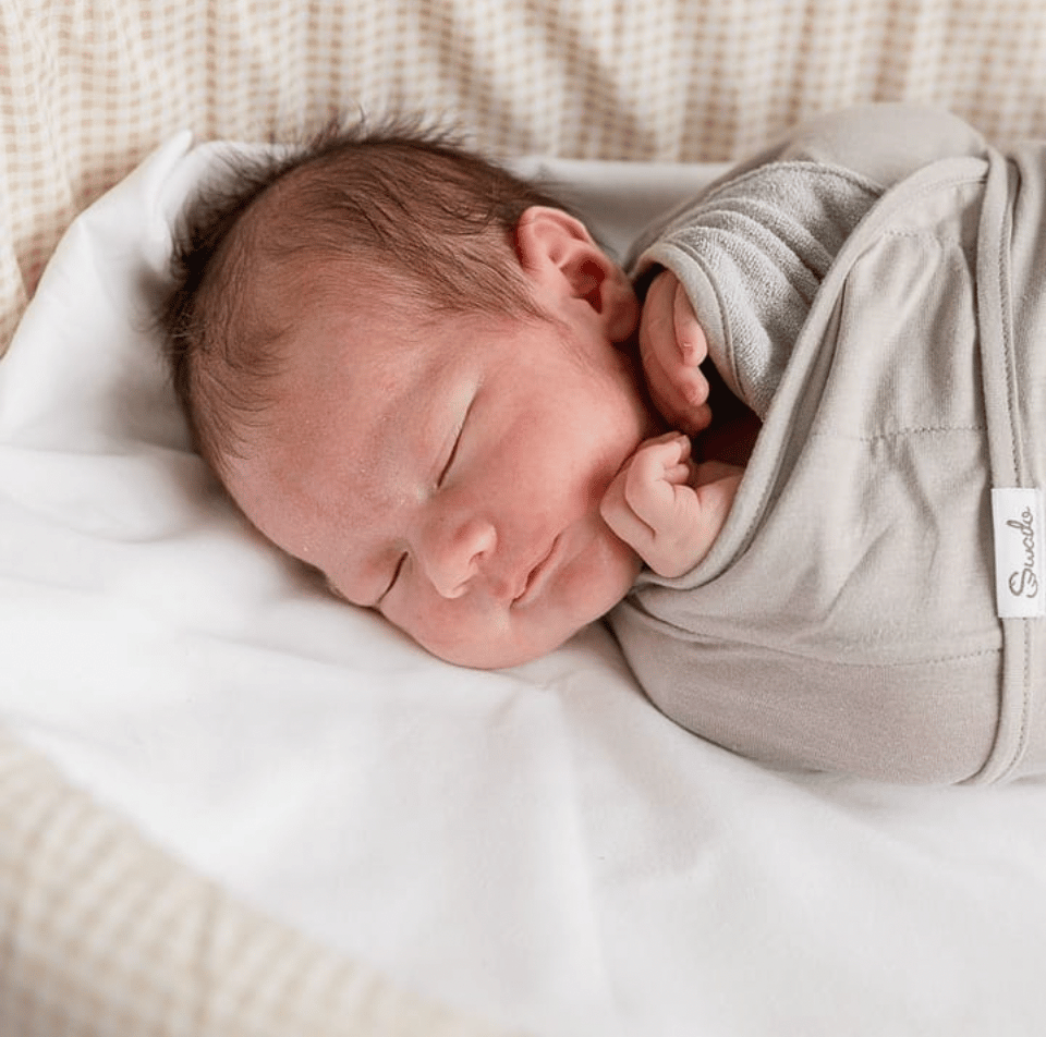 How to Position Your Babys Arms When Swaddling