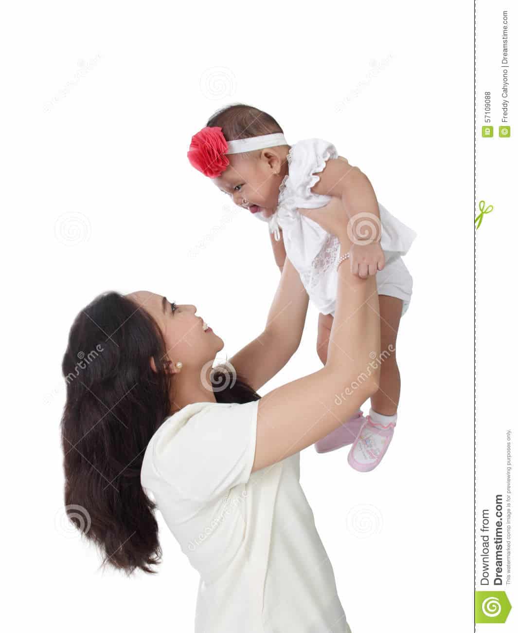 Mom lift baby up stock photo. Image of diaper, face, childhood