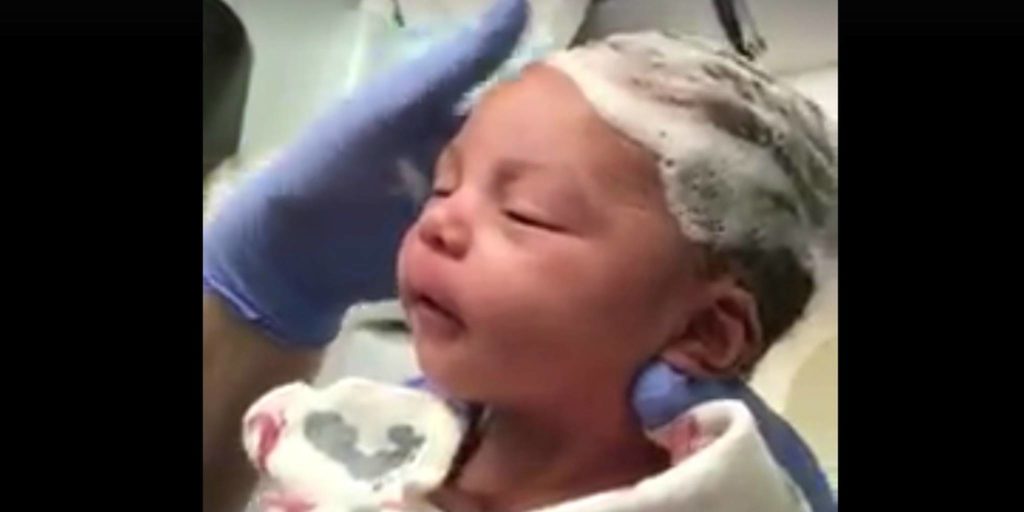 This Newborn Baby Getting Her Hair Washed Is Having the ...